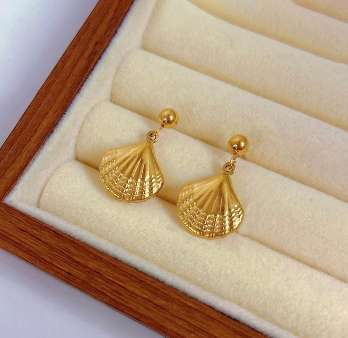shell themed earrings