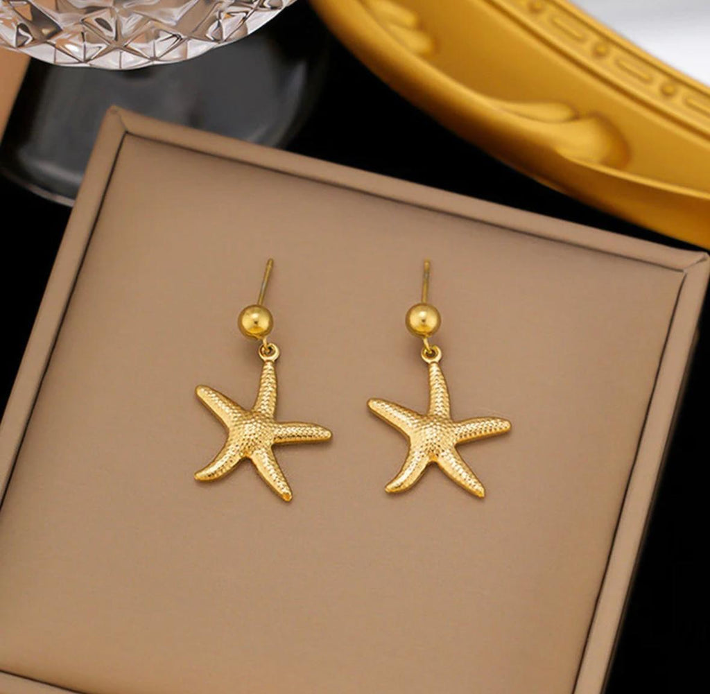 star themed earrings
