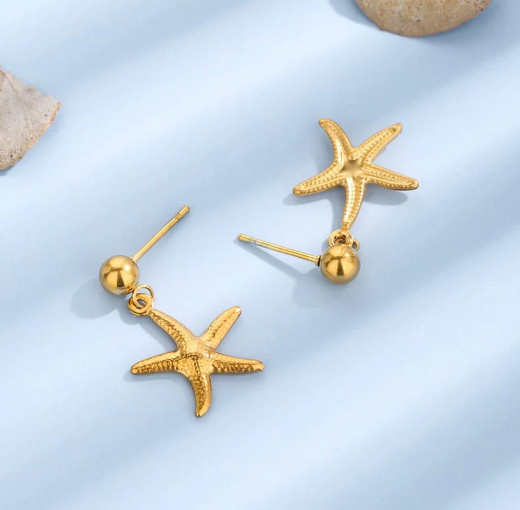 star themed earrings
